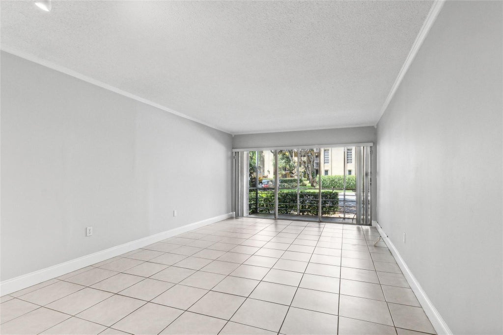 Photo of 485 N Pine Island Road #105A, Plantation, FL 33324 (MLS # B26080353)