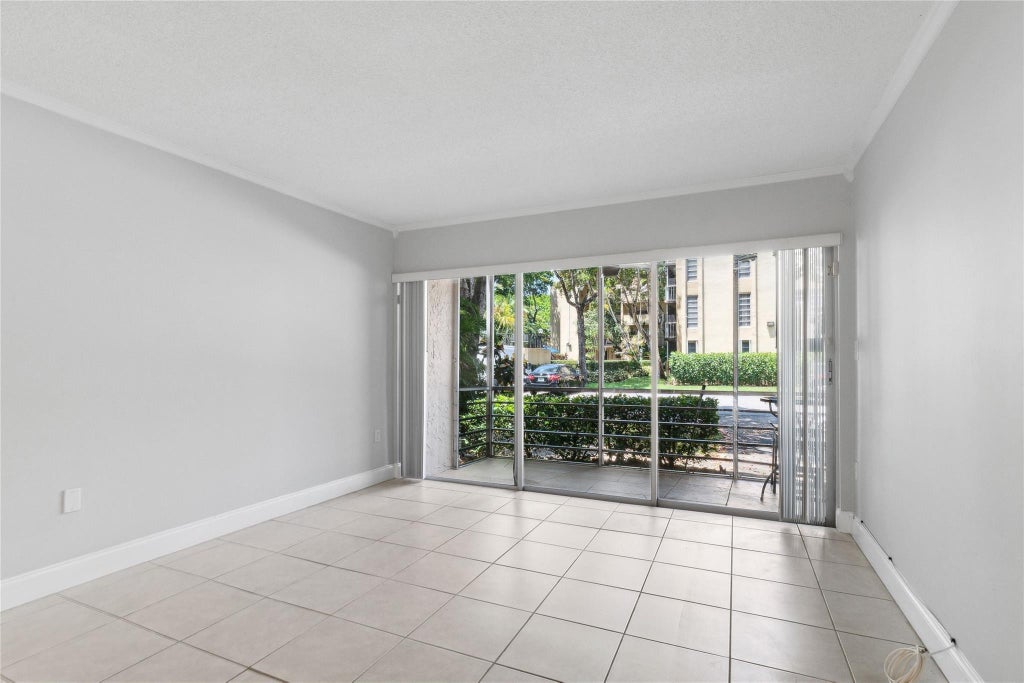 Photo of 485 N Pine Island Road #105A, Plantation, FL 33324 (MLS # B26080353)