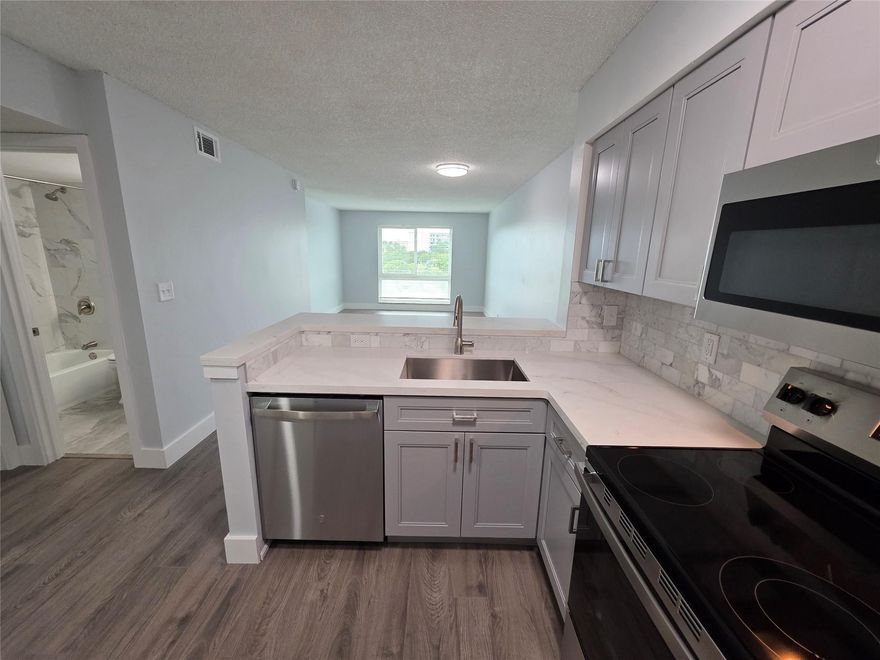 Completely renovated top to bottom! New waterproof vinyl floors, quartz counters, baseboards, fresh paint, stainless steel appliances & more! Conveniently located in desirable Cypress Bend, this top floor Penthouse unit is just 12 min. from the beach. It has all impact windows, large rooms, large closets, in unit washer dryer, and great storage space. The living area and owners suite offer an incredible waterfront view through large picture windows. The kitchens and bathrooms have contemporary, updated cabinetry and countertops. Complex features 2 heated pools, clubhouse, gym, spa, sauna, tennis, walking trails, sport courts. TopGolf, Walgreens, and popular restaurants nearby. HOA requires 640 minimum credit score per adult. $150/pp background check. 1 PET <20# w/$250 NR Dep. 1ST/LAST/SEC.