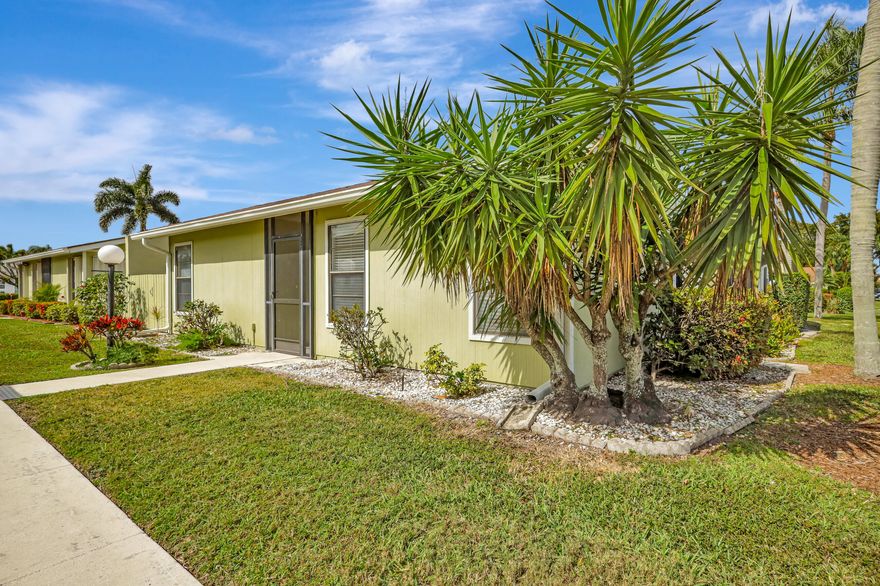 This spacious one-story villa is conveniently located in West Palm Beach near schools, shopping, the Ballpark of the Palm Beaches, and is a very short walk to the community clubhouse with pool, tennis courts, and playground. With a large, private screened-in patio off of the living room and kitchen, and a second separate private, open patio off of the primary suite, this villa is light and bright! Additional features include 2019 A/C. 2021 W/H, and a spacious laundry room with cabinet storage.  The kitchen and baths are original. Tile flooring throughout with the exception of the living room and 2nd bedroom, which have carpet. Some of the photos included in the listing have been virtually staged to provide ideas for furniture placement. There are two assigned parking spaces.