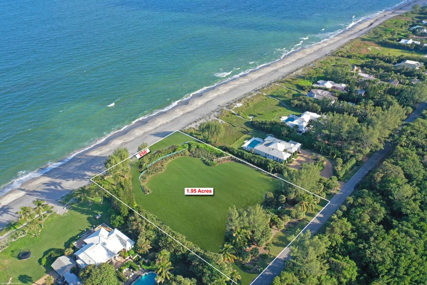 67 N Beach Rd is the largest oceanfront parcel available on Jupiter Island, This 2 acre lot with 250' of DIRECT OCEAN FRONTAGE has wide water views of the turquoise Atlantic.  Available total floor area of 10, 632 sq ft which cover a main house and several accessory buildings (guest cottage, pool house, garage) with tons of open space to install lush landscaping and seaside gardens. Plans designed by renowned architect Kevin Asbacher  have been approved by the Jupiter Island Building Dept or a Buyer could elect to build a house customized to fit their family's needs. The photos display the current structures that sit on the property and virtual images of the property after the buildings have been razed. The location near Bridge Rd provides quick access to shopping, restaurants and airport.