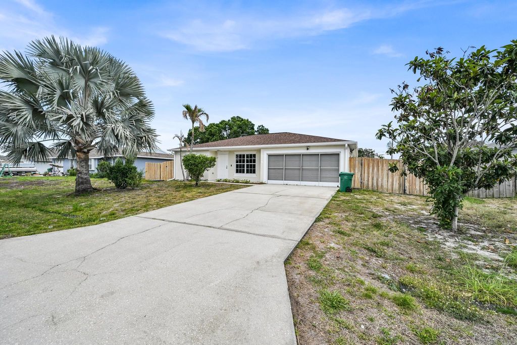 Photo of 726 SW Bond Road, Port Saint Lucie, FL 34953 (MLS # B26023221)
