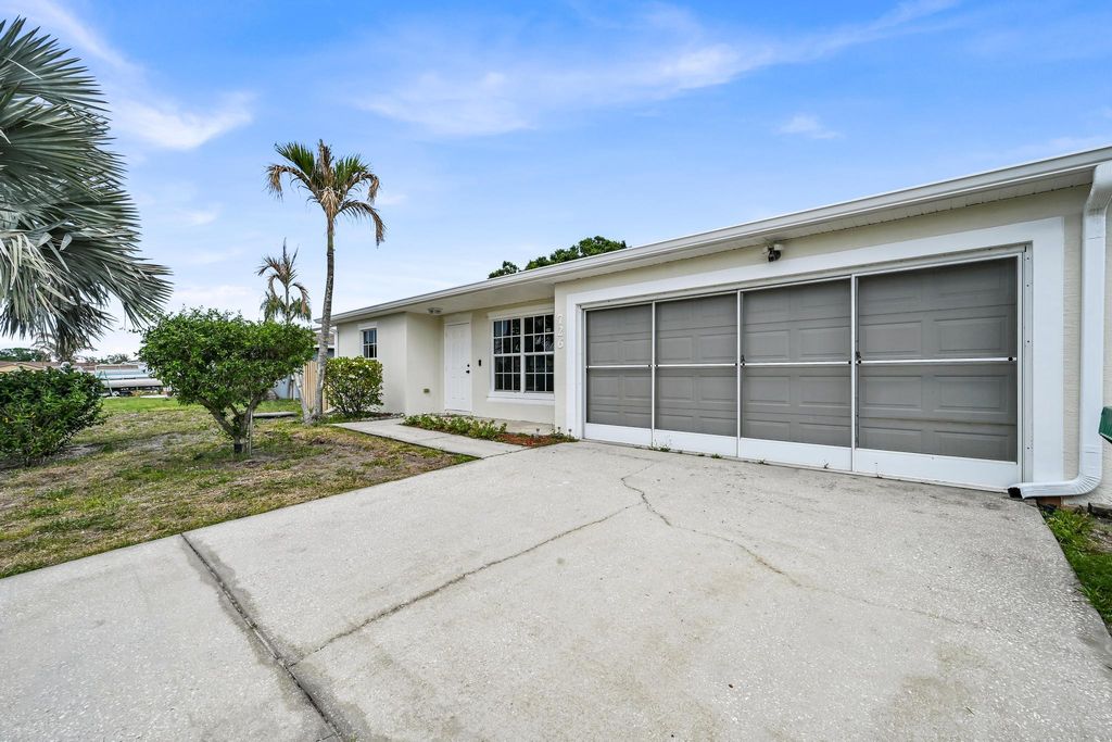 Photo of 726 SW Bond Road, Port Saint Lucie, FL 34953 (MLS # B26023221)