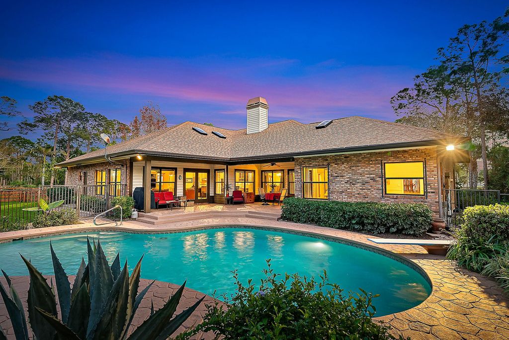 Photo of 14370 Caloosa Boulevard, Palm Beach Gardens, FL 33418 (MLS # R11106102)