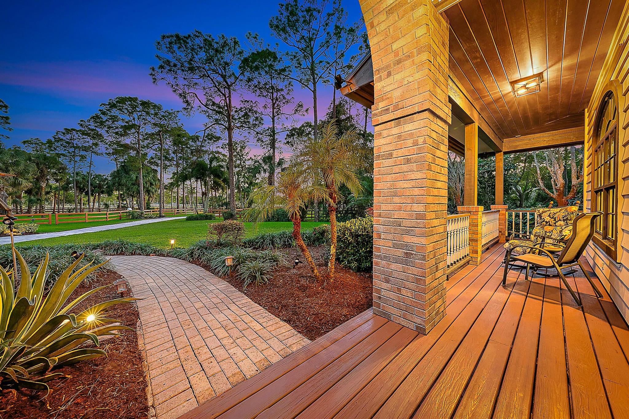 Across the street from a 32-acre equestrian park with arenas, a round pen, and jump courses, this 5-acre property is a dream for horse lovers. Set on high ground with access to 30 miles of bridle trails, it offers true equestrian charm with 6 paddocks, quality fencing, dual gated entrances, and a 3-stall barn with walk-outs, auto-waterers, feed room and tack room, plus a large attached workshop. The character-filled home features vaulted ceilings, a fireplace, open living areas, and 4 bedrooms, including a guest ensuite and a spacious primary suite with a walk-in closet. A free-form pool with a waterfall overlooks the barn and pastures, while a welcoming front porch, paver drive, and electric gate add to the appeal. Recent upgrades include a 2023 roof, skylights, gutters fresh paint,