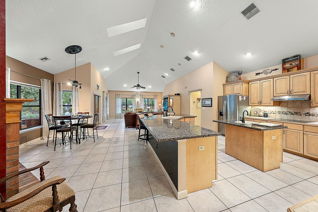 Photo of 14370 Caloosa Boulevard, Palm Beach Gardens, FL 33418 (MLS # R11106102)