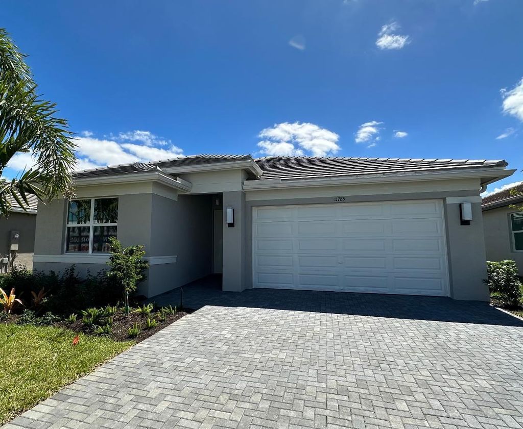 Photo of 11785 SW Oceanus Boulevard, Port St Lucie, FL 34987 (MLS # R10880710)