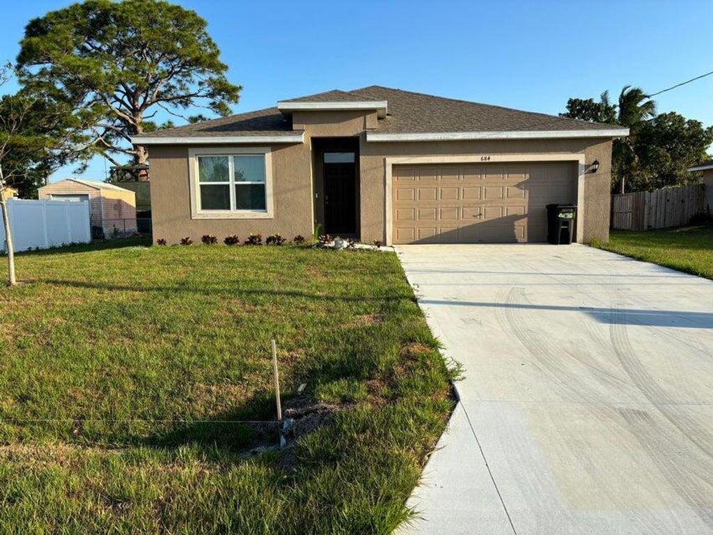 Photo of 684 NW Treemont Avenue, Port Saint Lucie, FL 34983 (MLS # R11097363)