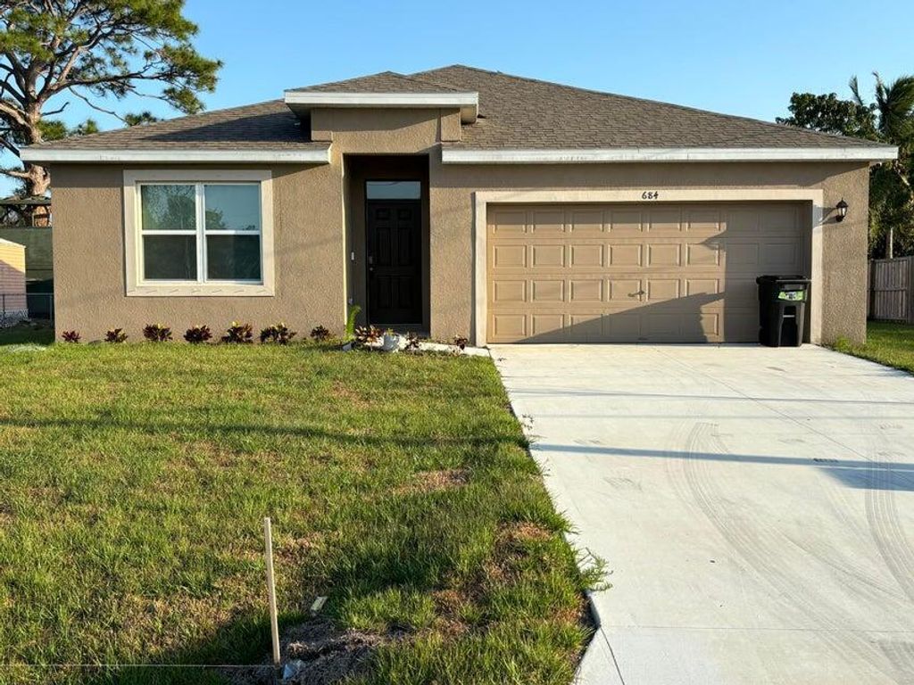 Photo of 684 NW Treemont Avenue, Port Saint Lucie, FL 34983 (MLS # R11097363)