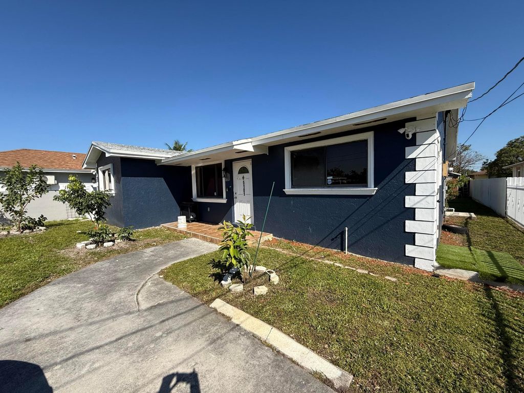 Photo of 5101 SW 24th Street, West Park, FL 33023 (MLS # B26006456)