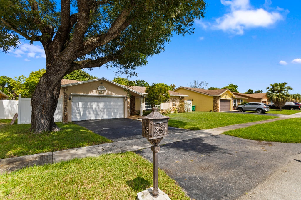 Photo of 3750 NW 73rd Avenue, Lauderhill, FL 33319 (MLS # B26065398)