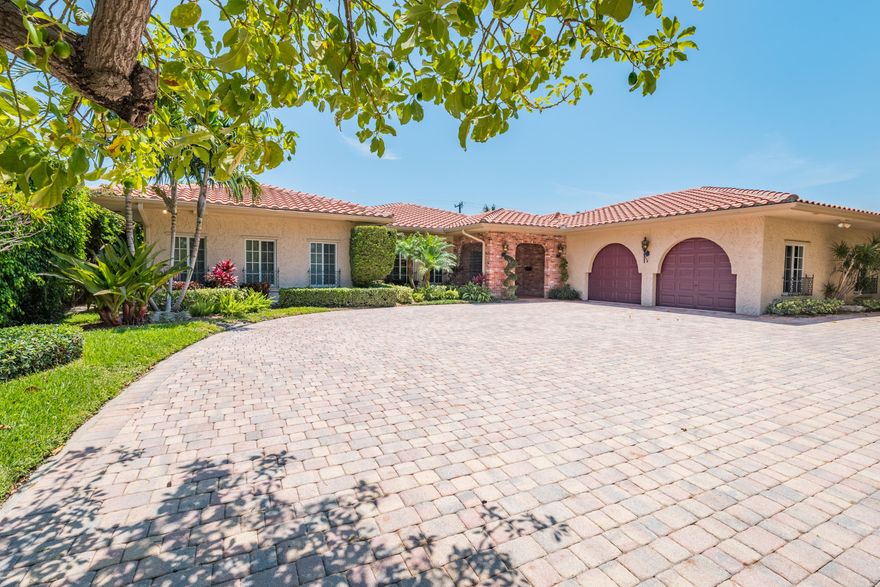 OPEN SUNDAY, October 1st 2- 4 PM weather permitting. JUST REDUCED!Classic CBS and Brick home with the feeling of Old Europe. This residence has 5 bedrooms an 3.5 baths and is situated on a 15,000 SF Lot among multii-million dollar homes and is across from the Intracoastal. It is just short blocks to the Ocean and its fabulous adjacent beaches. The home has a remodeled Kitchen, remodeled Master bedroom and bath. IMPACT STORM WINDOWS/DOORS THROUGHOUT HOME!The Oversized lot has a large pool, waterfall and Spa. You'll love your estate's tropical view from your oversized screened, pavered porch. Lovely flowering trees punctuate the landscape. Zoned air. Excellent Schools available. Near downtown Boca, Mizner Park and the Boca Hotel, as well as the coming Mandarin Oriental EASY TO VIEW.