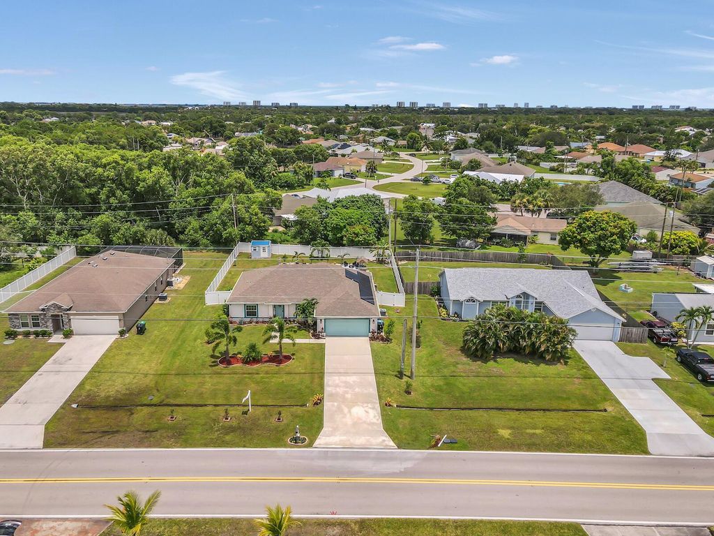 Photo of 2073 SE Berkshire Boulevard, Port Saint Lucie, FL 34952 (MLS # R11110391)