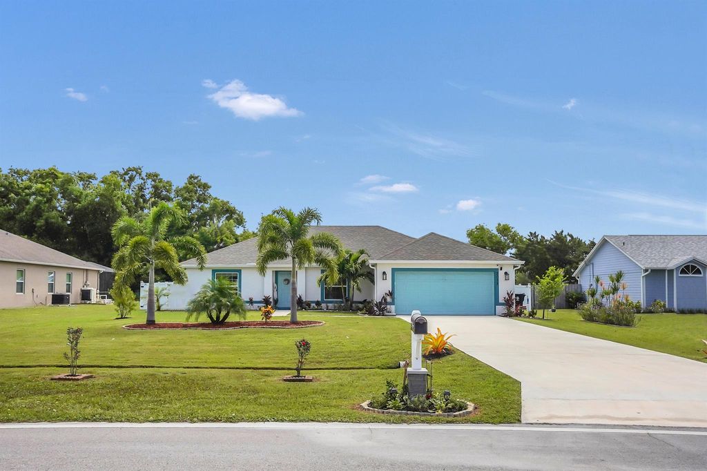 Photo of 2073 SE Berkshire Boulevard, Port Saint Lucie, FL 34952 (MLS # R11110391)