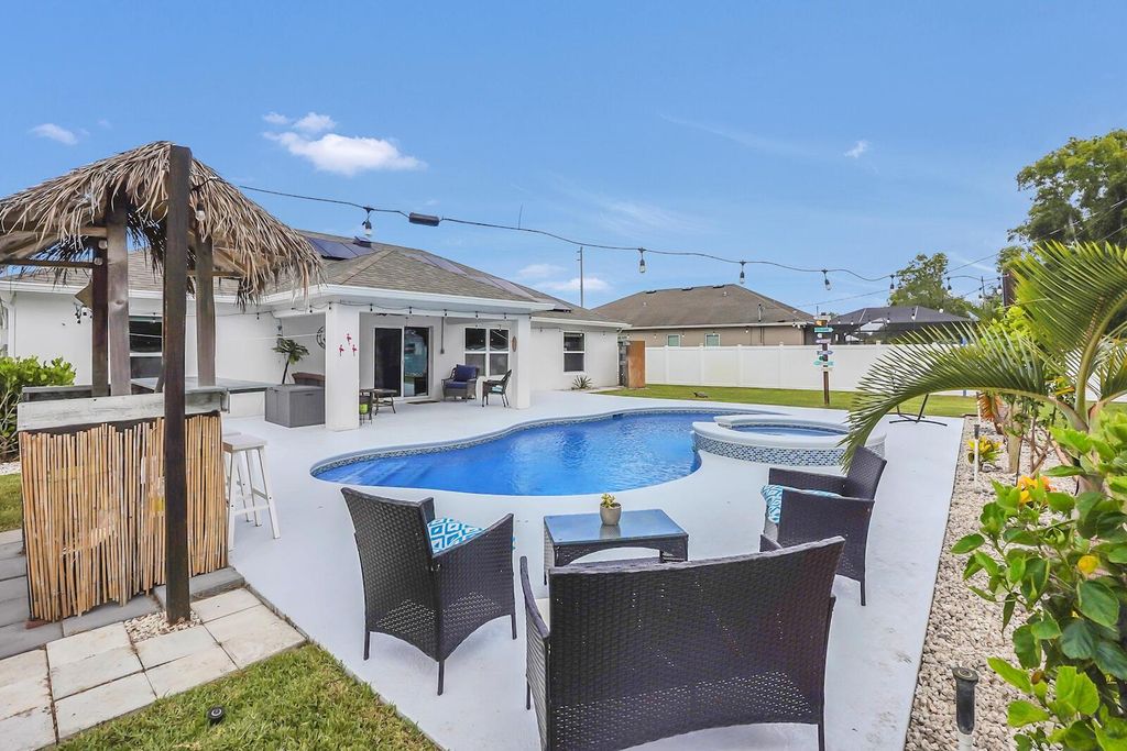 Photo of 2073 SE Berkshire Boulevard, Port Saint Lucie, FL 34952 (MLS # R11110391)