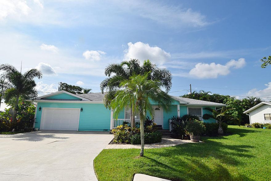 Discover like new perfection in Palm City! Current owner remodeled and upgraded home! New flooring throughout! New pool liner & fence in 2015! Master bath completely remodeled with new shower, new vanities w granite + new walk-in closet with custom shelving! New paint inside & out! New privacy fence! 2nd bath completely remodeled! Custom shelving in 2nd & 3rd bedroom closets! New lighting fixtures throughout! Kitchen has granite counters, built-in desk, LG French door SS refrigerator! Living room wired for surround sound! Great location! Call listing office before it is too late. This won't last long!