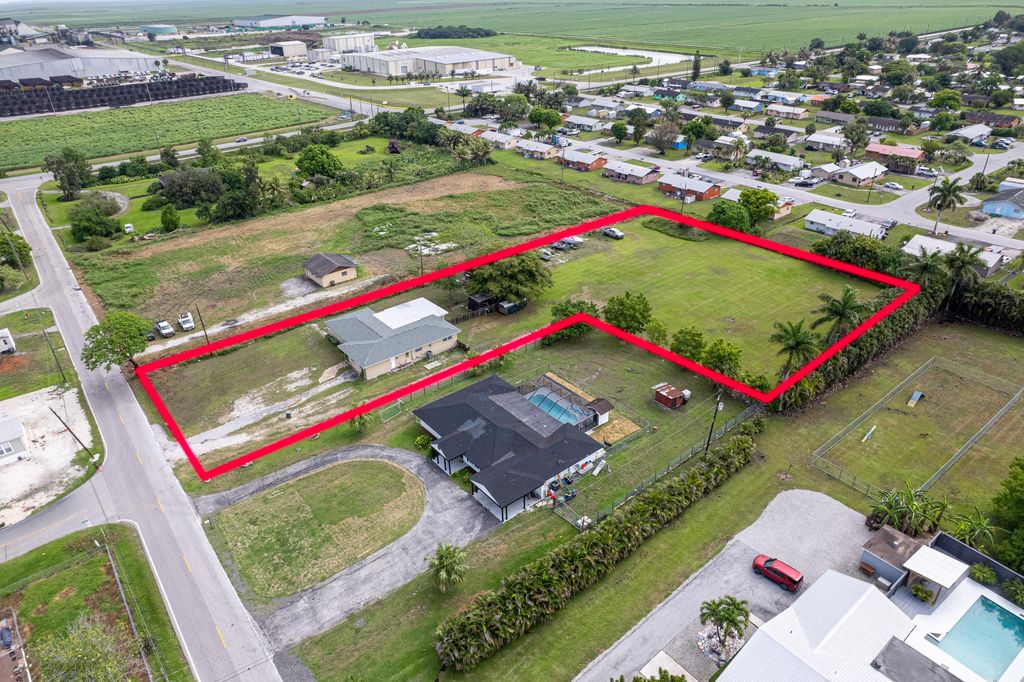 Photo of 1009 NE 18th Street, Belle Glade, FL 33430 (MLS # B26027694)