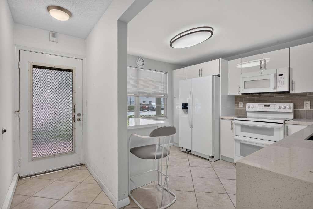 Photo of 2006 GRANADA Drive #J1, Coconut Creek, FL 33066 (MLS # B26059376)