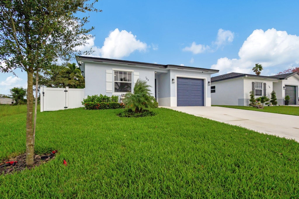 Photo of 166 Neva Drive, West Palm Beach, FL 33415 (MLS # R11136447)