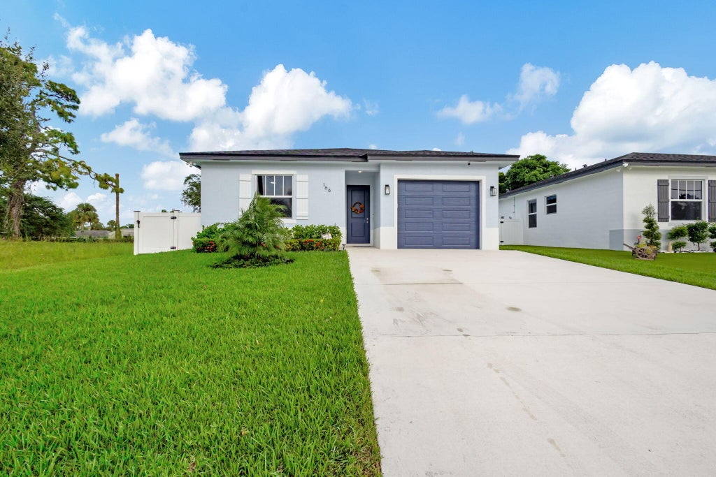 Photo of 166 Neva Drive, West Palm Beach, FL 33415 (MLS # R11136447)