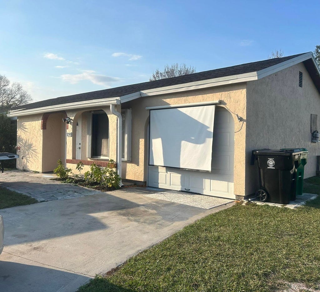 Photo of 3250 SW Belmont Place, Port Saint Lucie, FL 34953 (MLS # R11058735)