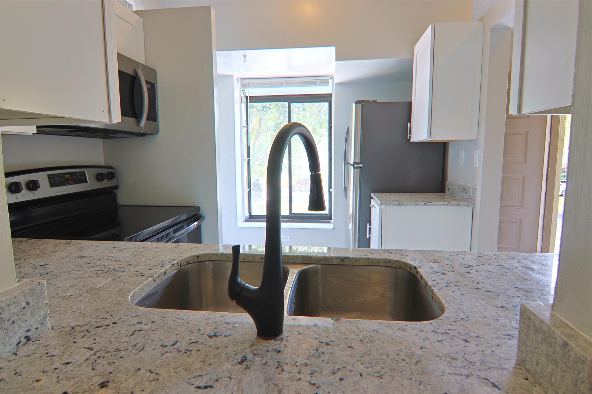 GARDENS NORTH ELEVEN COND - Residential Lease