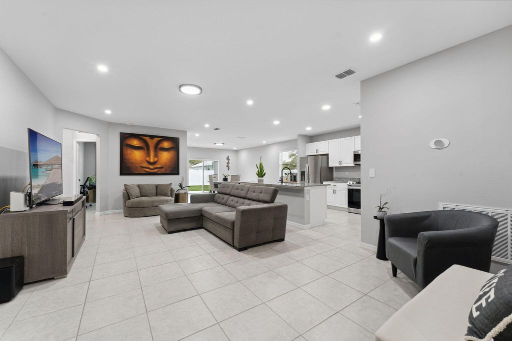 Photo of 4642 SW Eagle Street, Port Saint Lucie, FL 34953 (MLS # R10957166)