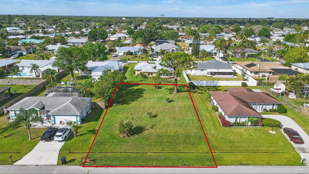 Photo of 440 SE Asbury Lane, Port St Lucie, FL 34983 (MLS # R11076827)