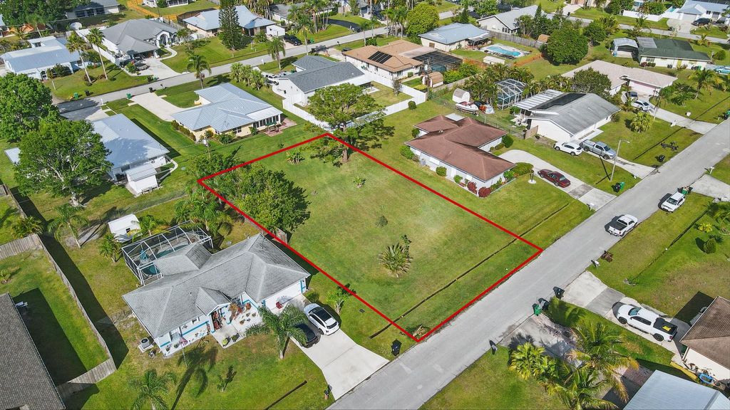 Photo of 440 SE Asbury Lane, Port St Lucie, FL 34983 (MLS # R11076827)