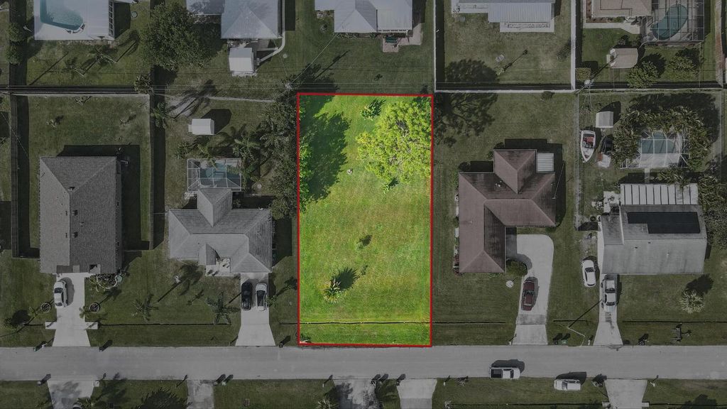 Photo of 440 SE Asbury Lane, Port Saint Lucie, FL 34983 (MLS # R11076827)