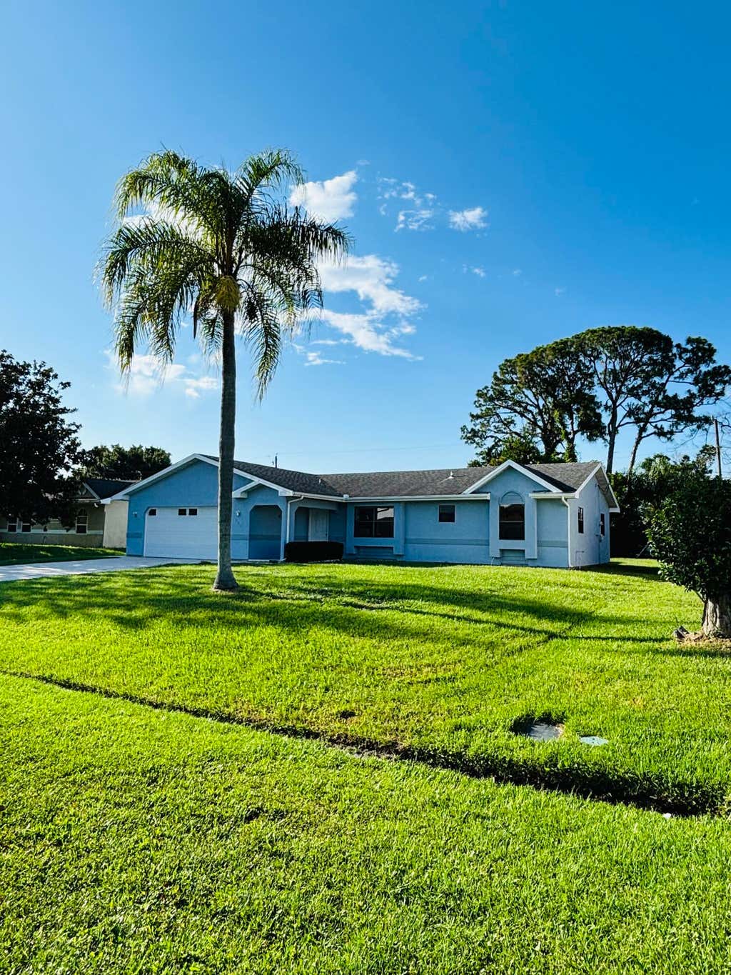 Photo of 337 NW Tyler Avenue, Port Saint Lucie, FL 34983 (MLS # B26046910)