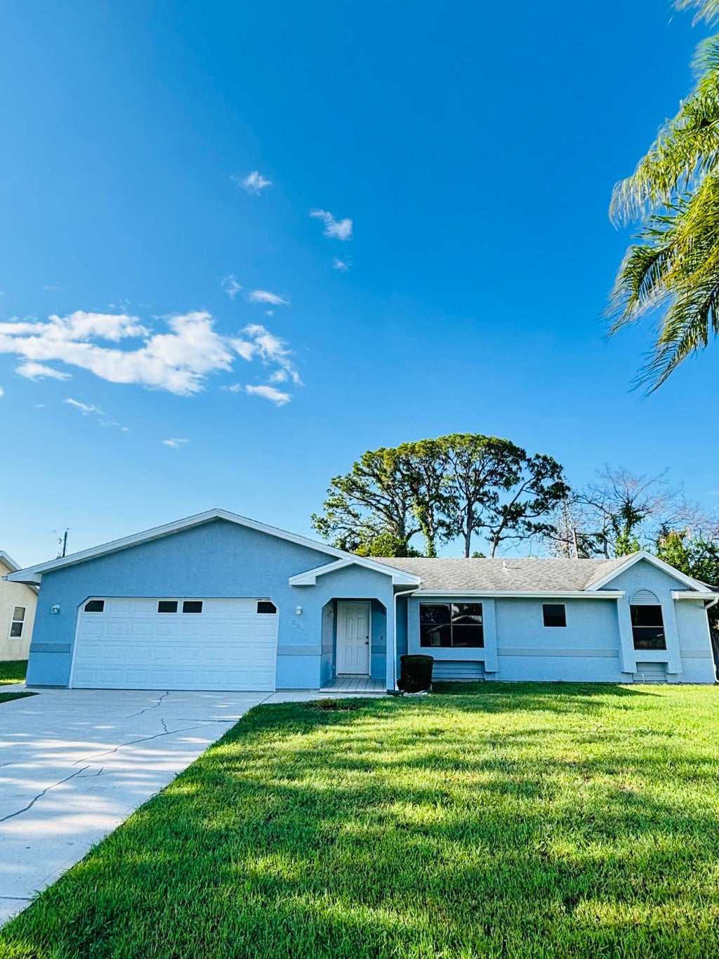 Photo of 337 NW Tyler Avenue, Port Saint Lucie, FL 34983 (MLS # B26046910)