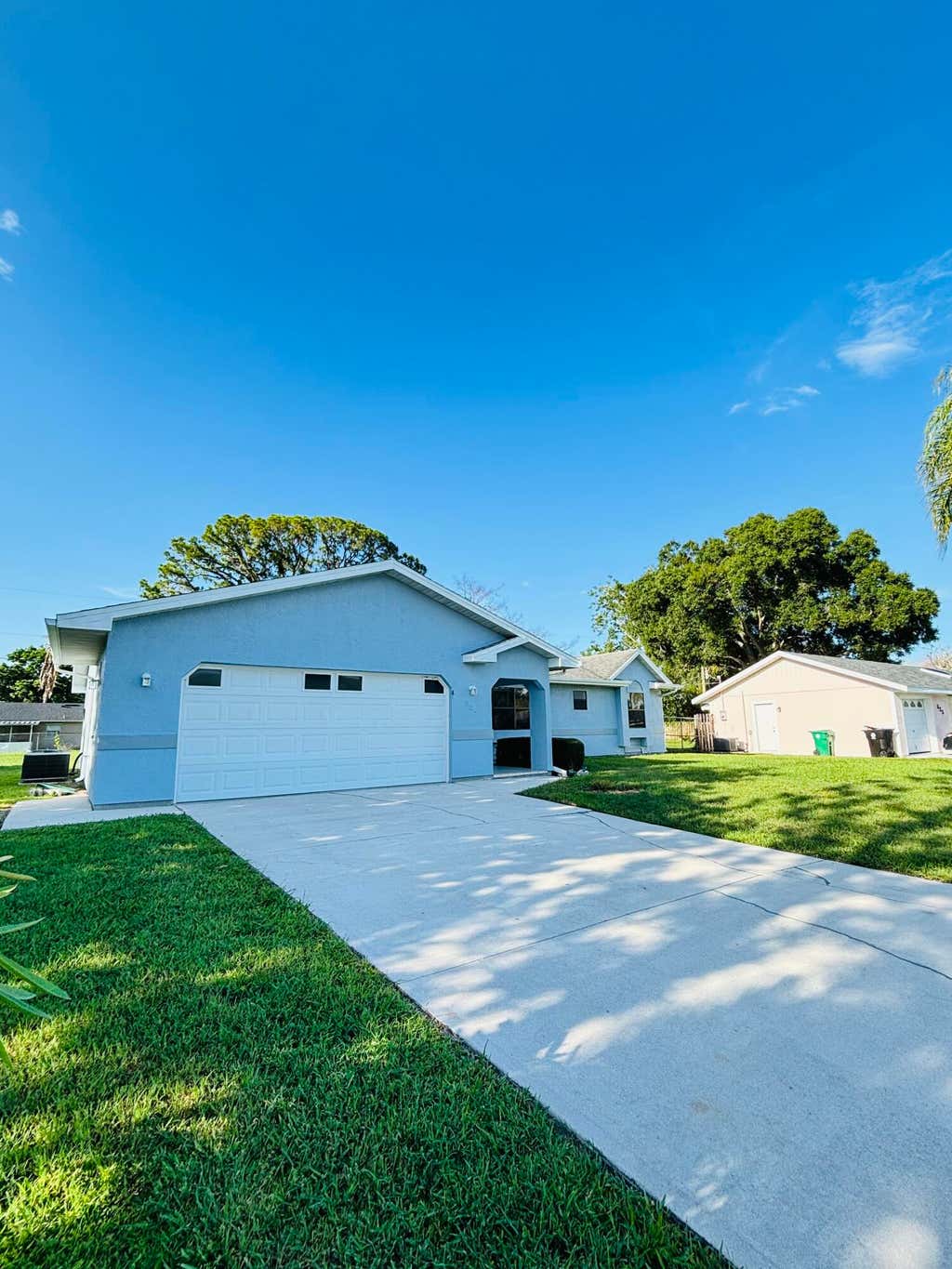 Photo of 337 NW Tyler Avenue, Port Saint Lucie, FL 34983 (MLS # B26046910)
