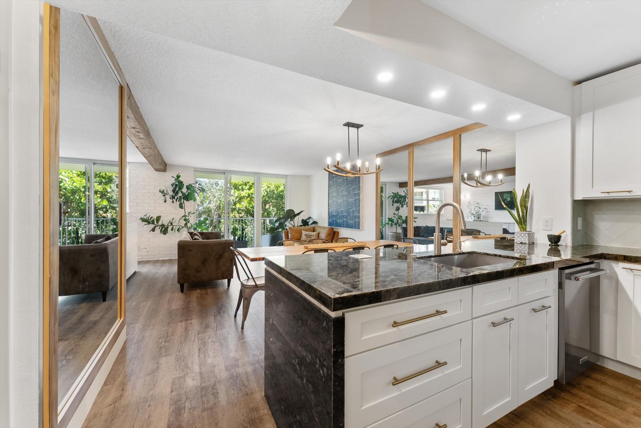 Step into effortless luxury in this fully furnished 1-bedroom, 2-bath boutique, oceanfront condo building in South Palm Beach. Originally a 2-bedroom, this reimagined layout offers an open-concept design perfect for entertaining, with flexible space. Completely renovated, the unit features a sleek kitchen with high-end finishes, custom cabinetry, and premium appliances. Both bathrooms are updated, and impact windows provide comfort. Enjoy direct beach access and resort-style amenities including a heated beachfront pool, gated garage parking, on-site management, fitness center, clubhouse, billiards room, BBQ area, and more. Minutes from Publix, fine dining, luxury resorts, and world-class golf. Refined Coastal Living Condo, Available now!