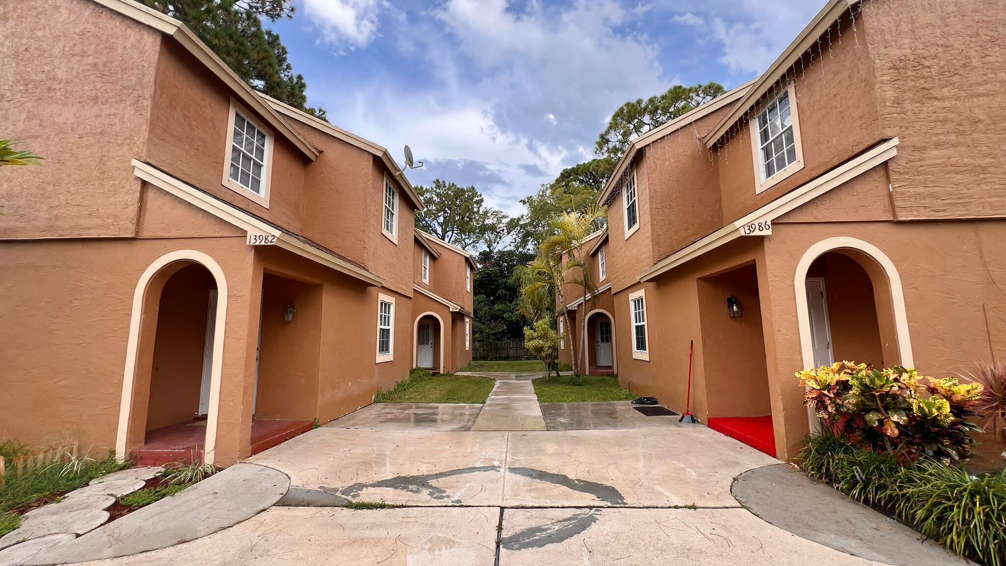 Spacious 2-story Townhome, 3 bedrooms, 2.5 bathrooms, corner unit located in the heart of Wellington, ready for a quick move-in! Well maintained, freshly painted and touched-up, with spacious bedrooms- all upstairs, a half bathroom downstairs and 2-full bathrooms upstairs, new cabinets in kitchen with newer appliances, screened-in patio with storage room, and a full size new washer & dryer in the unit. This complex has a shared yard and parking. Centrally located close to shopping, restaurants, top rated schools, entertainment, next door to Publix and much more!