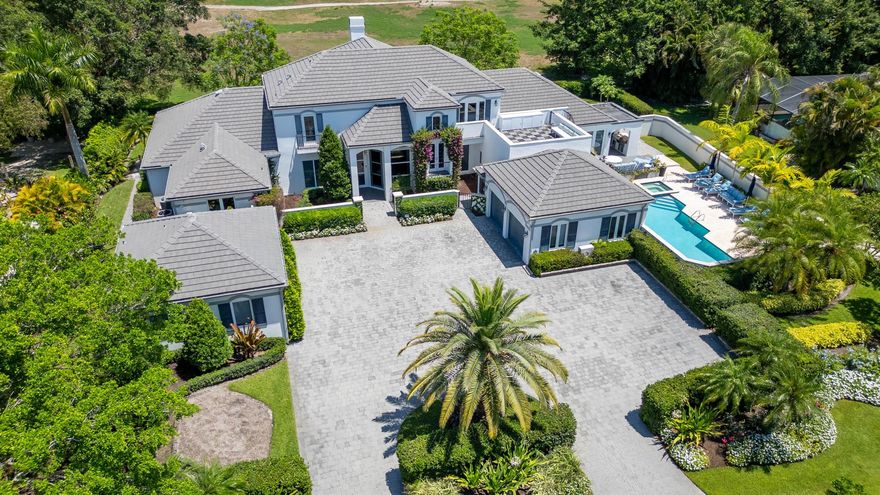 Completely renovated and ultra-private, this stunning estate on Maidstone Drive offers 5 bedrooms plus a separate, fully equipped 1-bedroom guest cottage. The spacious primary suite features a serene sun porch, while all three upstairs bedrooms boast their own private balconies. Perfect for entertaining and relaxing during the Winter season. It features a large pool area, lush landscaping, and a striking live wall. This property feels like a private resort - luxury, comfort, and style in the exclusive Palm Beach Polo and Country Club.