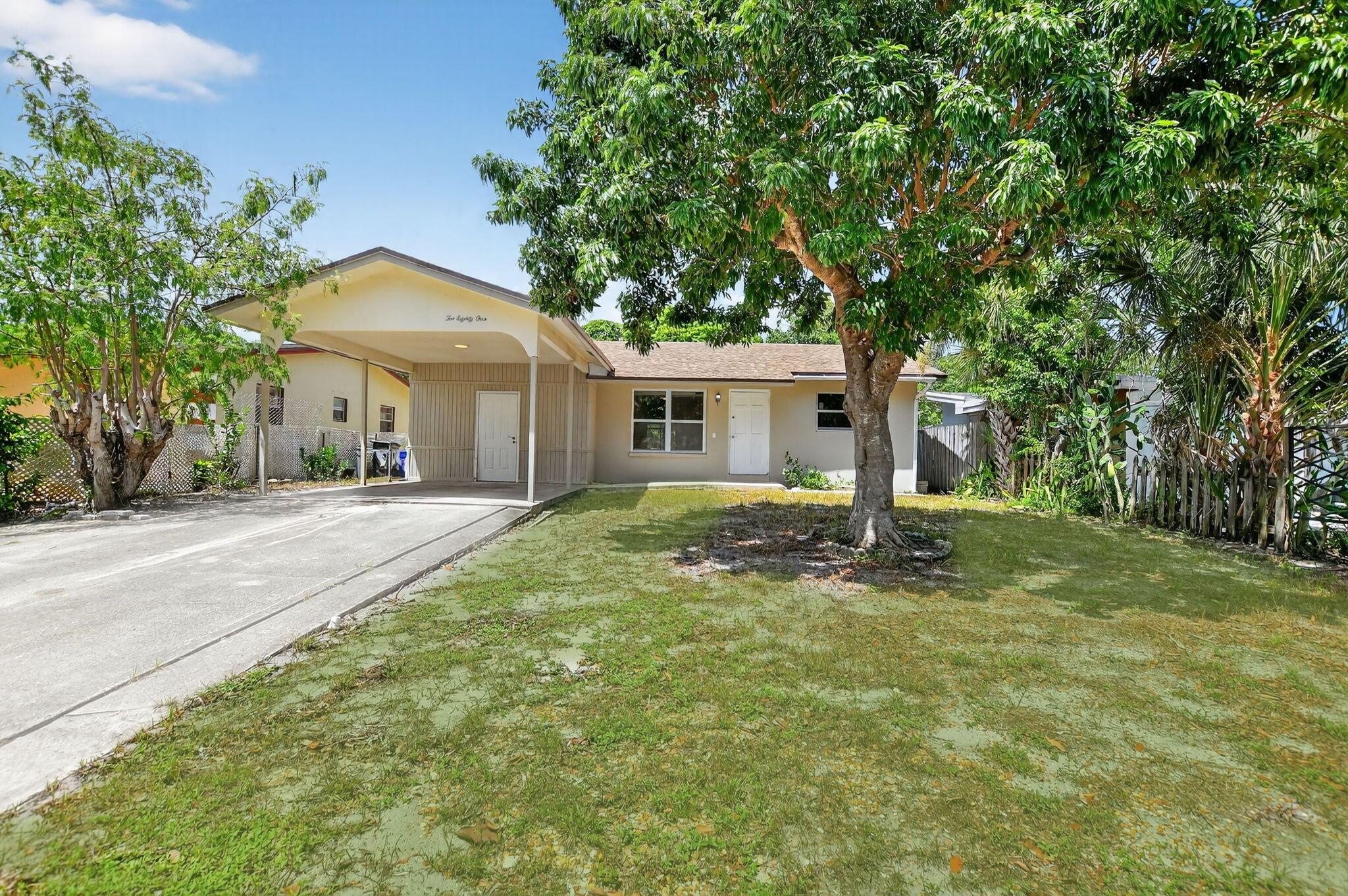 3BR/2BA Single-Family Home - Available 9/15/25. Move-in ready with no HOA approval! Recent updates include a new roof (2024), impact windows (2023), recently painted. Features tile floors, white kitchen cabinets, spacious master with walk-in closet, plus a bonus room for office/guest use. Enjoy a large screened patio, oversized backyard with mango trees, carport with storage, and extended driveway. Prime location east of I-95, minutes to the beach, FAU, Mizner Park, Atlantic Ave, dining, and shopping. No pets & no smoking per Landlord. Don't miss this opportunity!