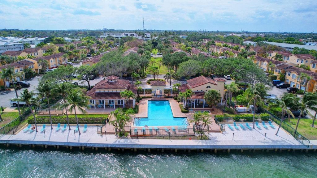 Photo of 1110 Lake Shore Drive #101, Lake Park, FL 33403 (MLS # F10457559)