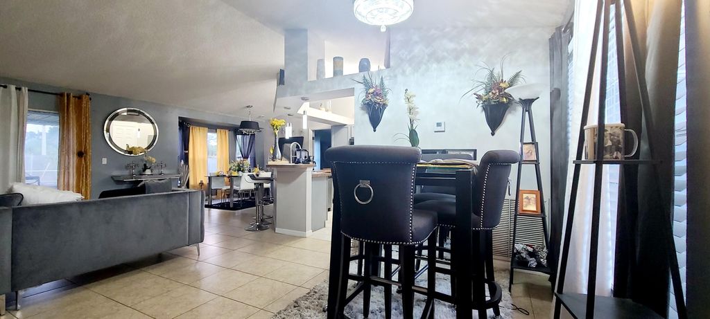 Photo of 1322 SW Halford Avenue, Port Saint Lucie, FL 34953 (MLS # R10954346)