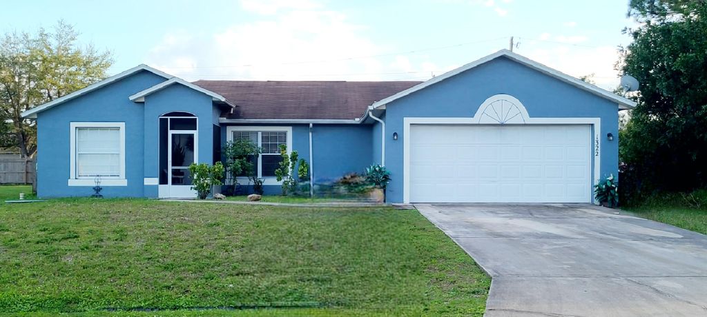Photo of 1322 SW Halford Avenue, Port Saint Lucie, FL 34953 (MLS # R10954346)