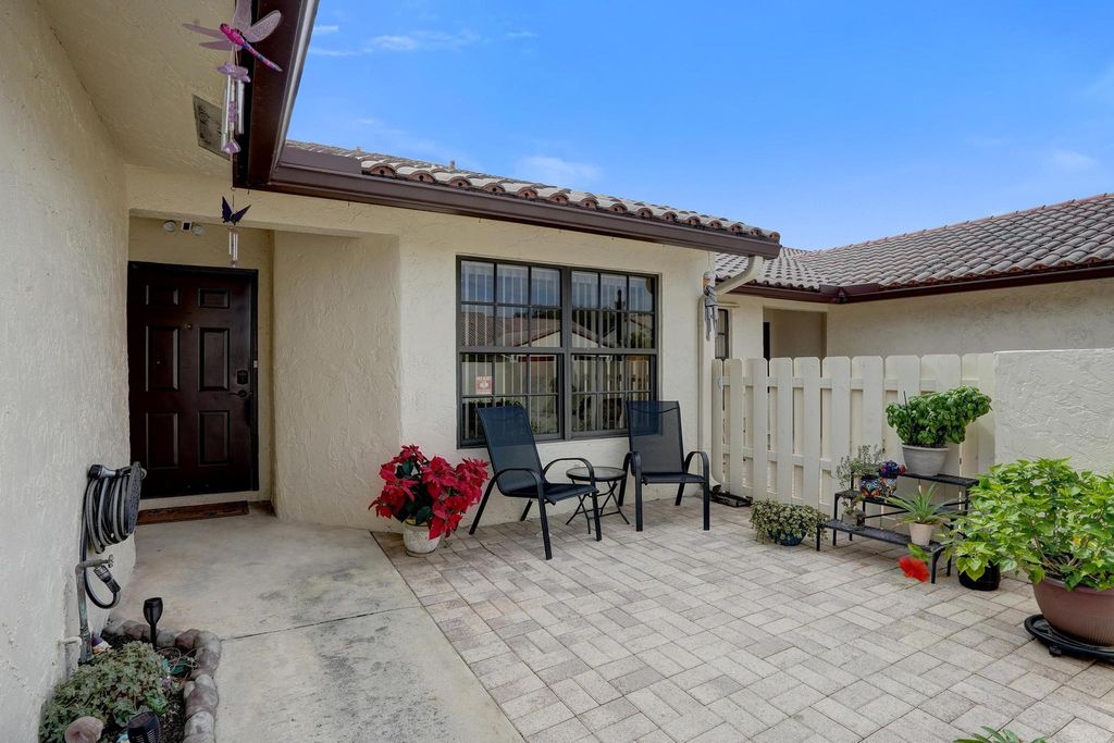 Photo of 410 Buttonwood Place, Boca Raton, FL 33431 (MLS # R11159510)