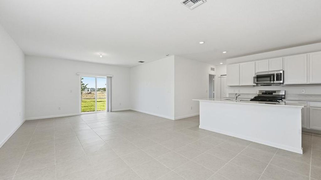 Photo of 5932 NW Sweetwood Drive, Port Saint Lucie, FL 34987 (MLS # R11159418)