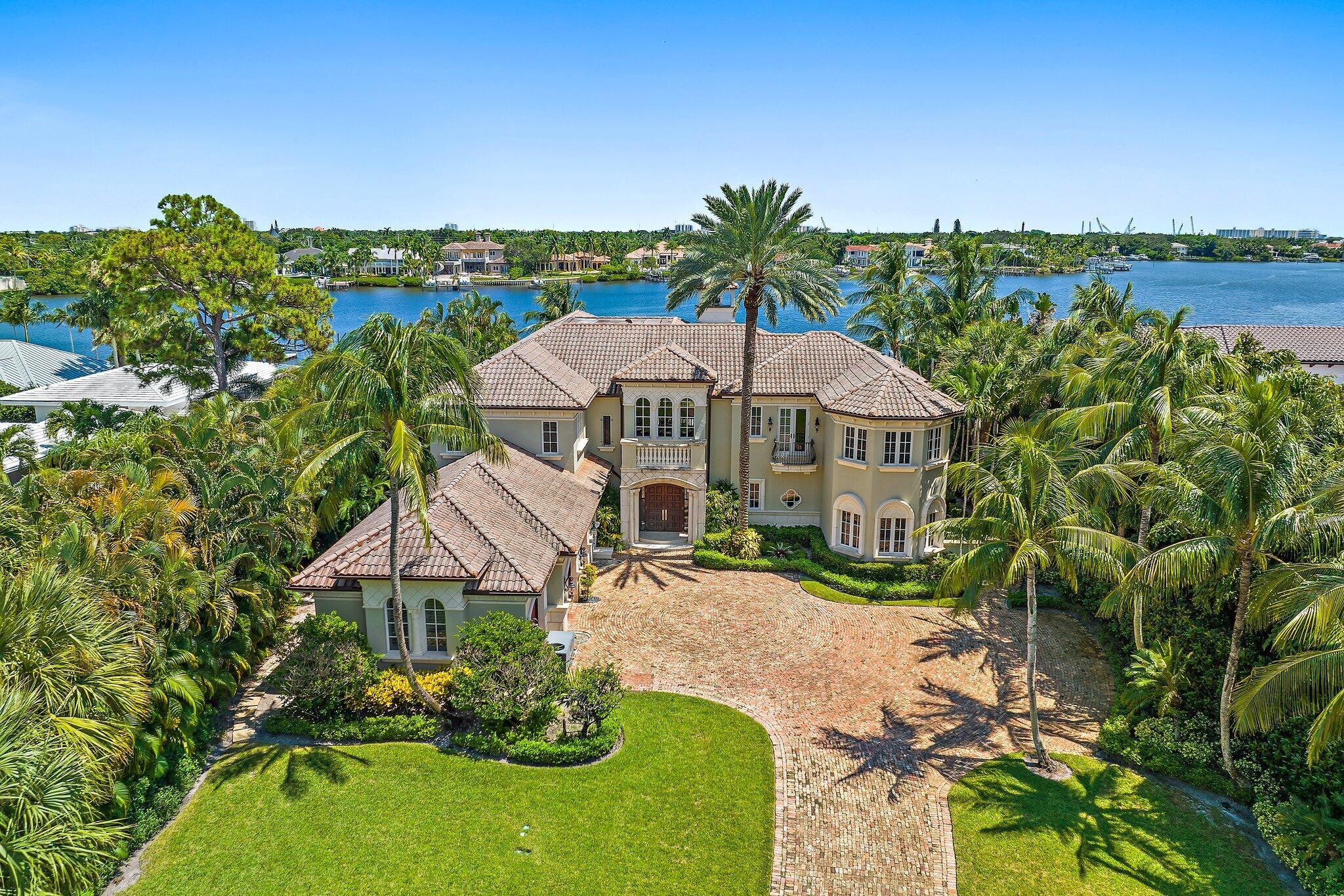 Absolutely gorgeous riverfront parcel in the heart of Tequesta on highly desirable Anchorage Point. With just under an acre, this premium lot has a seawall, fully equipped dock w/ lift and 109' of direct river frontage. The 2-story CBS home is equipped with 5 bedrooms, 6 1/2 bathrooms and a 3-car garage.