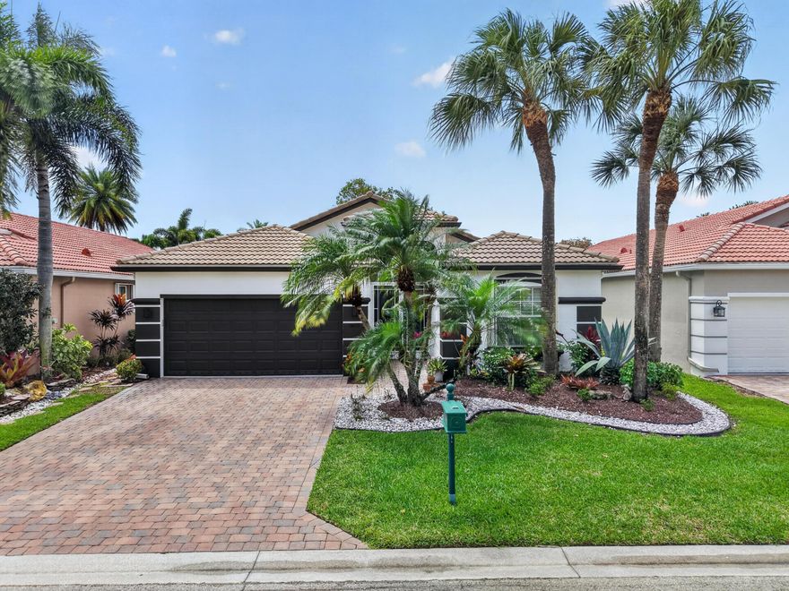 OMG! COMPLETELY UPDATED CONTEMPORARY PORTOFINO MODEL (GREAT ROOM CONCEPT) WITH A LARGE WATER VIEW. AMAZING HOUSE WITH  IMPACT FRONT DOORS, SCREENED ENTRY, PLANK TILE FLOORING, BEDROOMS HAVE LIKE-NEW CARPETING.  THE MASTER SUITE IS A TRUE RETREAT WITH A FREE-STANDING TUB, GORGEOUS QUARTZ COUNTERS, FINISHED END-CAP WOOD CABINETS, UNDERMOUNT SINKS, LOTS OF DRAWERS, DECORATOR LIGHTING & PLUMBING FIXTURES & AN AMAZING SHOWER! NEW HUNTER DOUGLAS WINDOW TREATMENTS. CUSTOM WALK-IN CLOSETS. THE KITCHEN WILL TAKE YOUR BREATH AWAY! WOOD CABINETS, QUARTZ COUNTERS (WATERFALL), QUARTZ BACKSPLASH, EXTRA CABINETS BY SNACK BAR, PULL-OUT SHELVES, POTS/PANS DRAWERS, LAZY SUSAN, SPICE CABINET & UNDER CABINET LIGHTING. THE GUEST BATHROOM IS FABULOUS AS WELL! QUARTZ COUNTER, WOOD CABINETS, COMFORT-HEIGHT  TOILETS IN BOTH BATHROOMS, FRAMELESS SHOWER DOOR (IN MASTER AS WELL), DECORATIVE LIGHTING & PLUMBING FIXTURES, FABULOUS SELECTION OF TILE IN THIS BATHROOM AS WELL. EXTENSIVE USE OF SHADOW-BOX MOLDING, CROWN & LARGE BASEBOARDS. THIS HOUSE WAS JUST PAINTED OUTSIDE &  PARTIALLY INSIDE (VERY LIGHT/BRIGHT). SNOWBIRDS LIVE HERE SO THE HOUSE HAS HARDLY BEEN LIVED IN. COME JOIN THE VERY ACTIVE VILLAGGIO LIFESTYLE: 2 CLUBHOUSES (SOCIAL/ATHLETIC), 2 POOLS (INDOOR/OUTDOOR), CAFE, FULL-SERVICE SALON, SHOW SERIES, PICKLEBALL, TENNIS, BOCCE, RACQUETBALL, PING PONG, CARDS, CLUBS & EXERCISE CLASSES 6 DAYS A WEEK AT NO ADDITIONAL CHARGE. A VERY WARM & WELCOMING COMMUNITY!