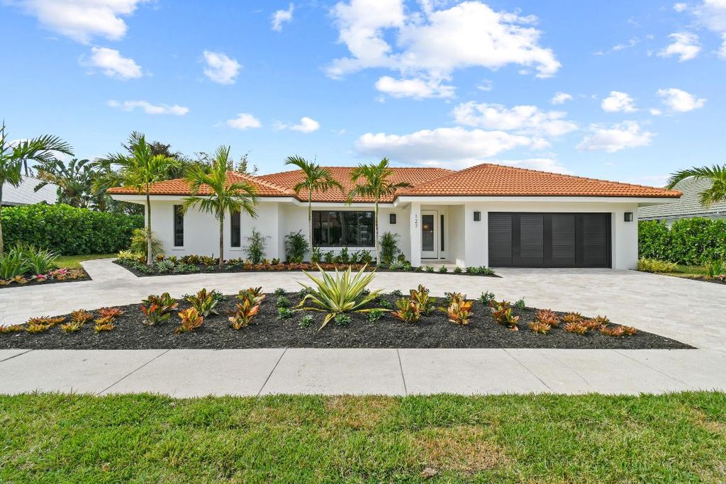 Photo of 127 Pegasus Drive, Jupiter, FL 33477 (MLS # R10940147)
