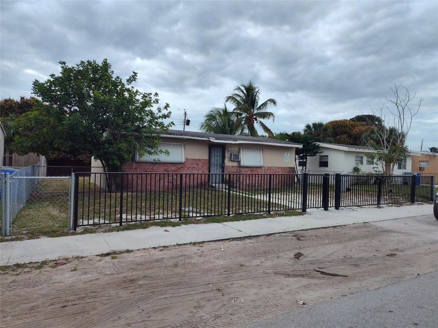 Great Investor opportunity, buy and hold opportunity or even a "flip" . House is set up as a 4/2, needs a full rehab.New Aluminum Rail Fence in front of house with driveway gate*,   and fully fenced in yard.150/sf  shed in the rear with water and elec.CLOSE BY: Nearly completed Broward Sheriff sub station around the corner at NW 27th ave & NW 4th CourtLocated near I-95 & the Turnpike for easy commuting to Miami Ft Lauderdale and more.Close to public transport, approx a mile to Super Walmart, Harrahs Casino, top Golf, Banking, restaurants and Doctor offices etc and just minutes from Pompano Beach .