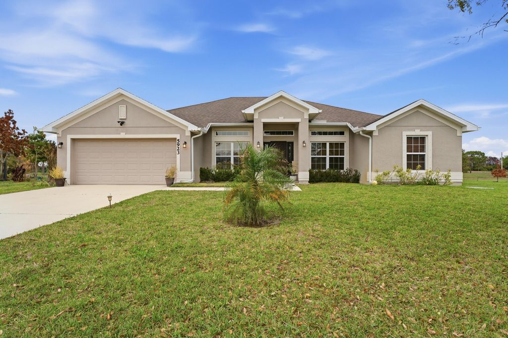 Photo of 5923 NW Brianna Court, Port Saint Lucie, FL 34986 (MLS # B26009971)