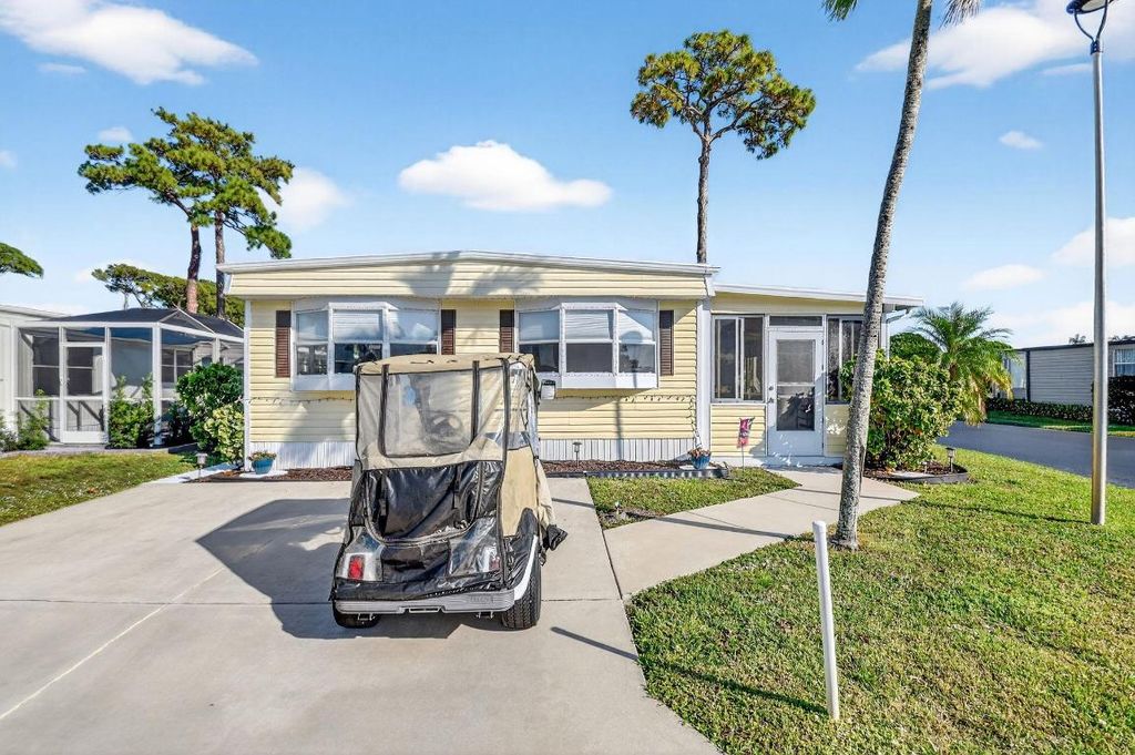 Photo of 12001 Iguana Bay, Boynton Beach, FL 33436 (MLS # R11146324)