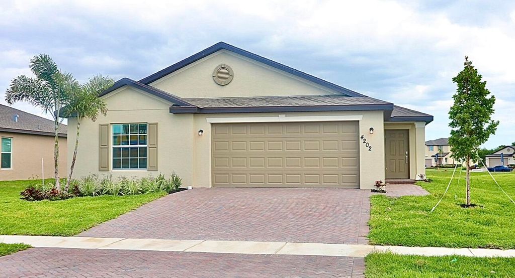 Photo of 4202 Longmour Lane, Fort Pierce, FL 34947 (MLS # R10981439)