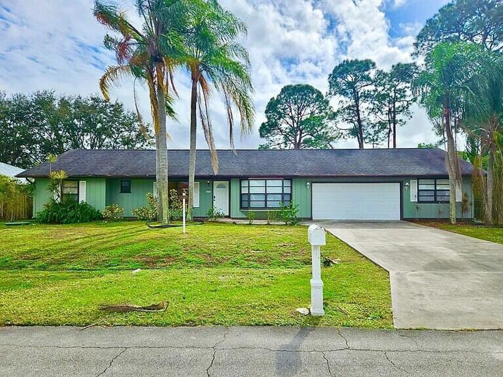 Photo of 406 SE Justine Terrace, Port Saint Lucie, FL 34983 (MLS # R11143684)